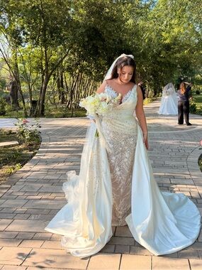 Valdrin Sahiti Elegant Ivory Beaded Bridal Gown with Detachable Train